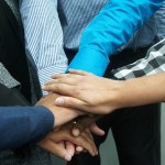 hands in a huddle